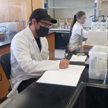 Students working in a lab on campus