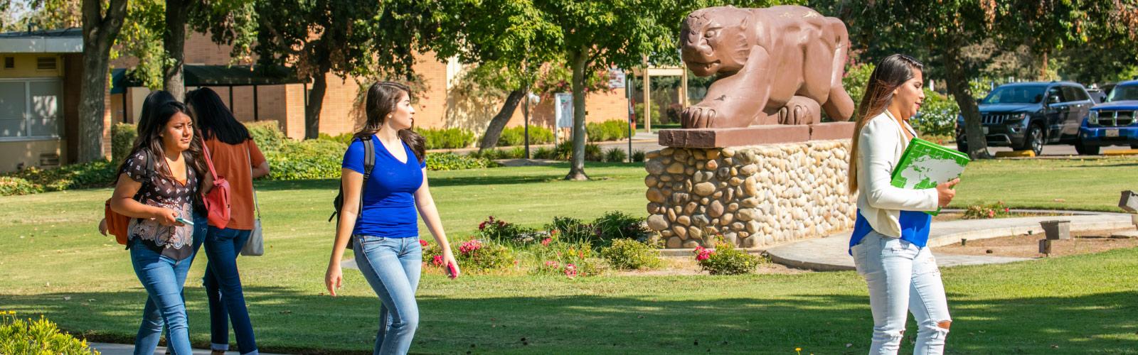 students walking in front of Reedley College