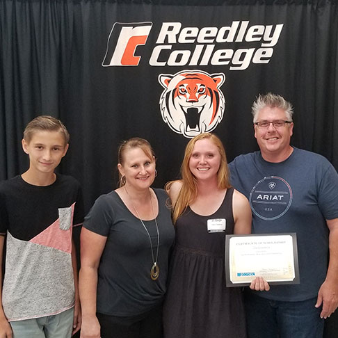 Scholarship recipient Zoey Cardoza with her family following the awards ceremony. 