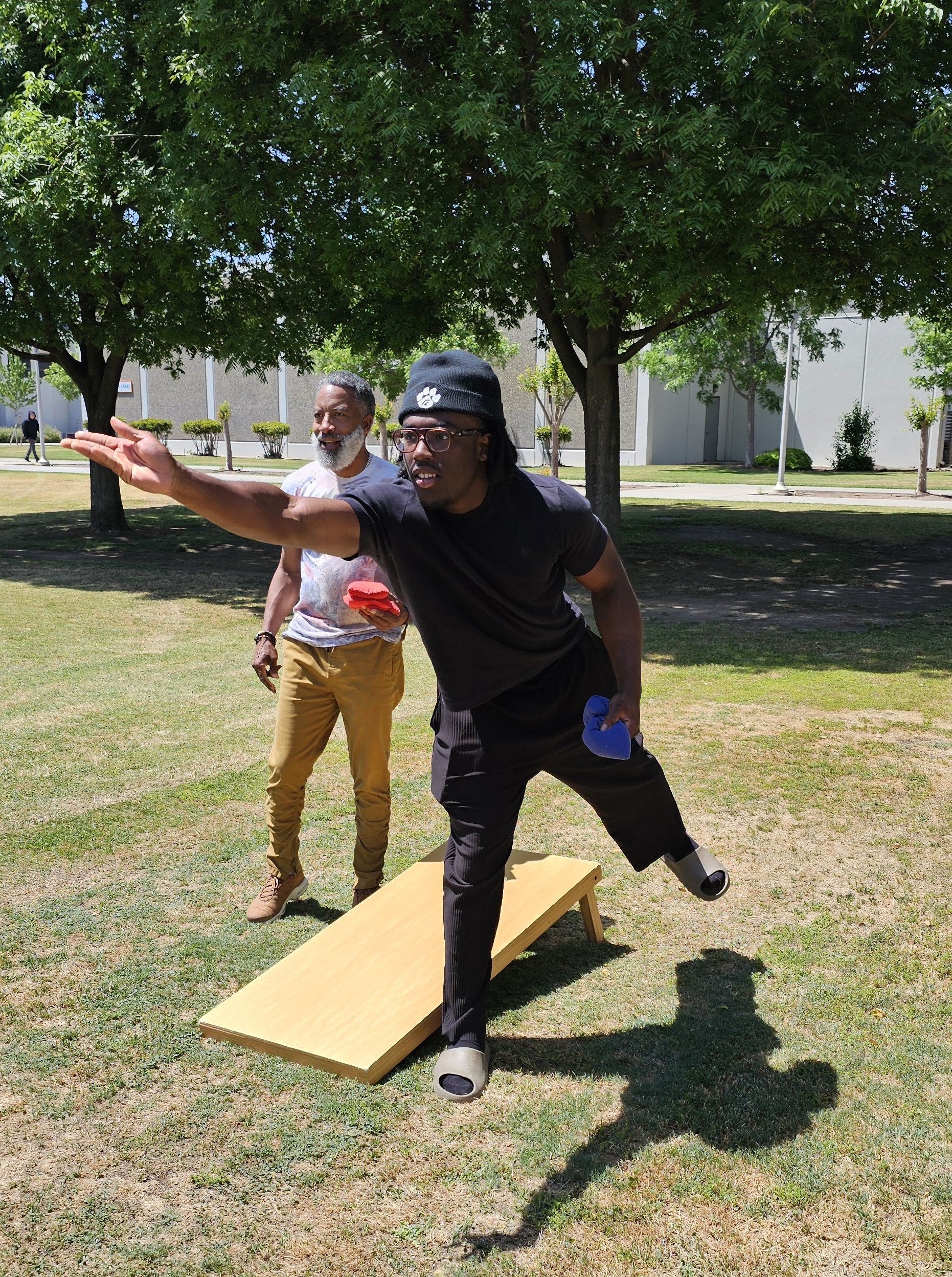 rc student playing cornhole