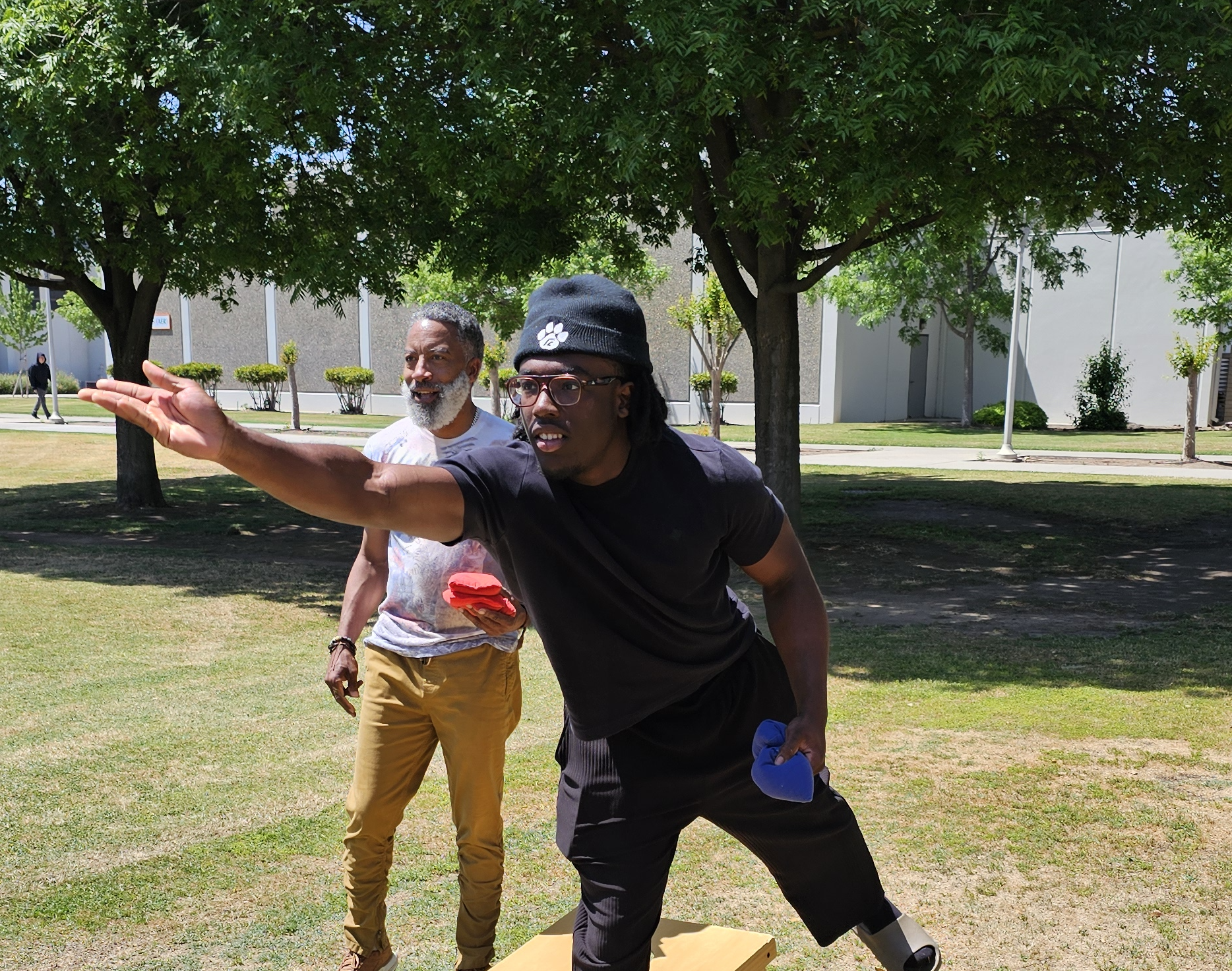 rc student playing cornhole