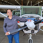 Darla holding plane propeller