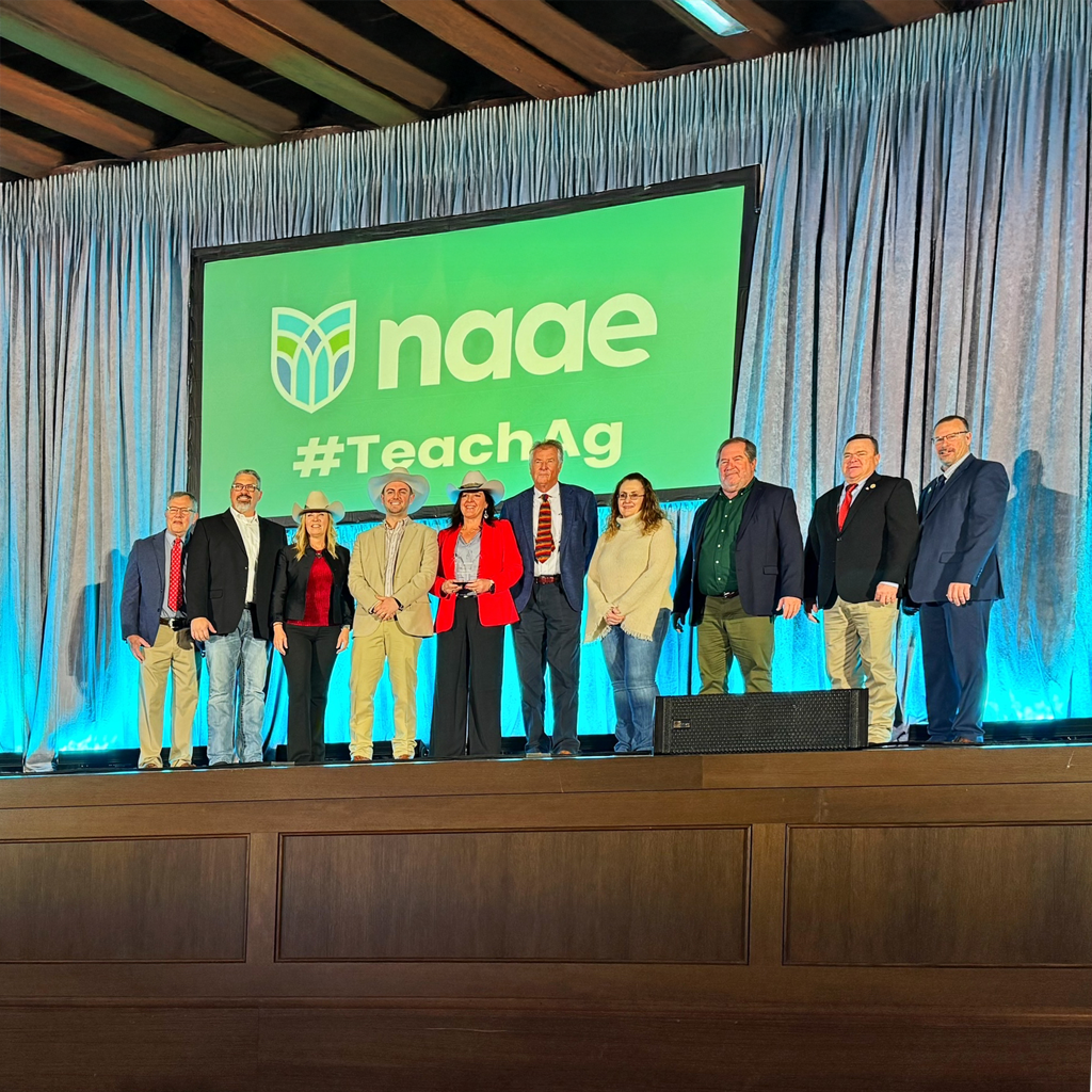 Group of professional educator standing on stage.