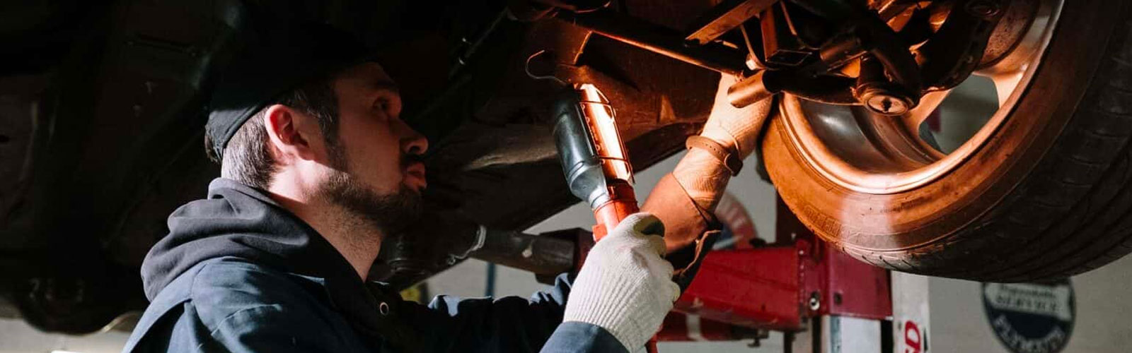 Auto Mechanic under car