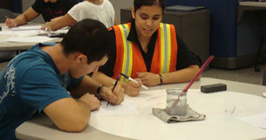 student getting tutoring in math center