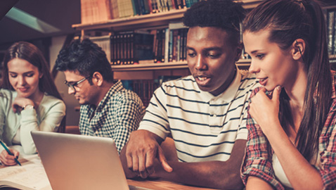 students on laptop